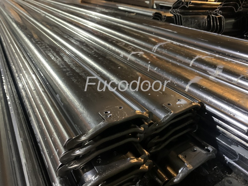 Cửa cuốn siêu trường INOX độ dầy 1.2mm, bản cong ST100, Cửa cuốn siêu trường 1,2ly, Cửa cuốn Siêu Trường INOX dầy 1.2ly