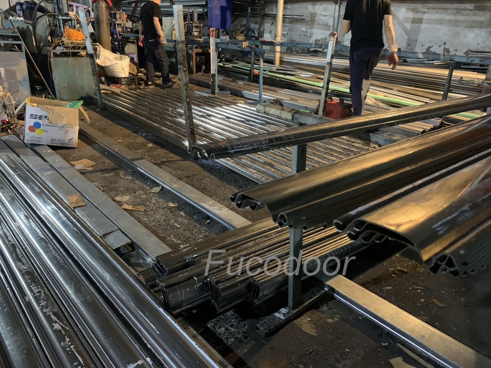 Cửa cuốn siêu trường INOX độ dầy 1.2mm, bản cong ST100, Cửa cuốn siêu trường 1,2ly, Cửa cuốn Siêu Trường INOX dầy 1.2ly