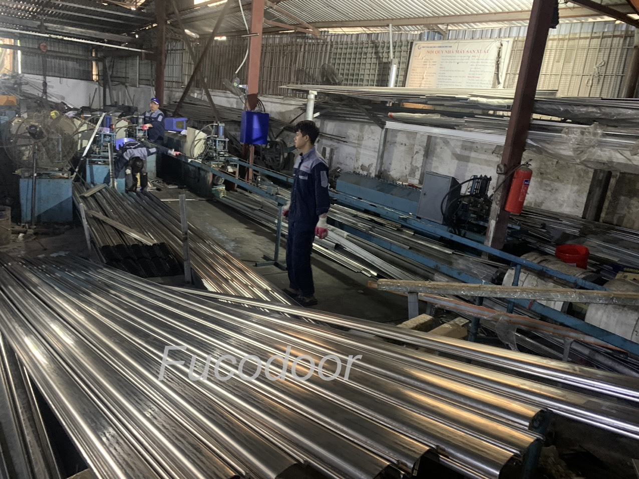 Cửa cuốn siêu trường INOX, ST100. Cửa cuốn siêu trường INOX 